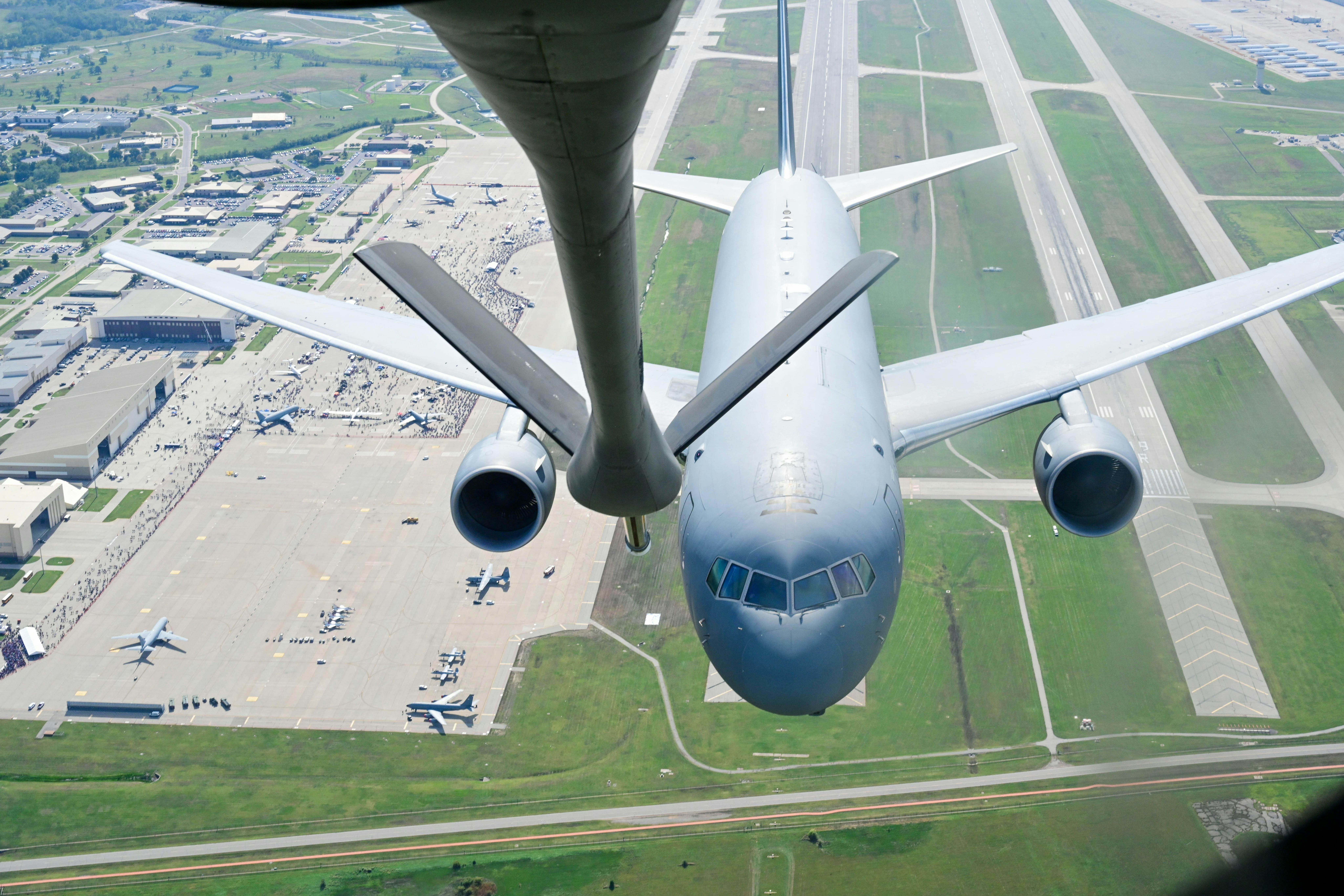 A KC-135 Stratotanker and KC-46A Pegasus conduct an aerial refueling dual flyover during the Frontiers in Flight Air Show and Open House at McConnell Air Force Base, Kan., These aircraft represent generations of innovation and support for the nation&rsquo;s airpower. The KC-135 Stratotanker has been the backbone of the U.S. Air Force&rsquo;s refueling fleet for decades, while the KC-46A Pegasus represents the Air Force&rsquo;s newest generation of tanker aircraft, designed to deliver enhanced refueling, cargo, passenger, and aeromedical evacuation capabilities for future global mobility. U.S. Air Force photo by Senior Airman Patrick O&rsquo;Neill.